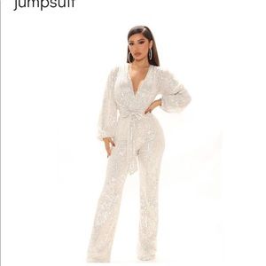 White Sequin Jumpsuit BRAND NEW, NEVER WORN. Size Large.